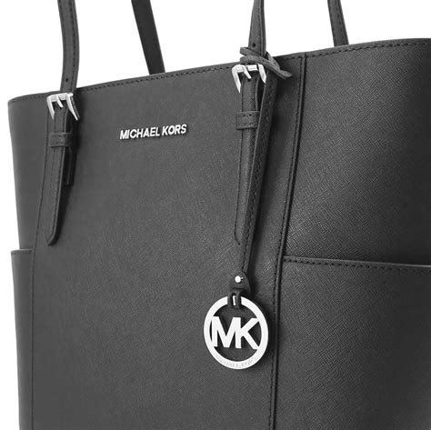 michael kors jet set schwarz ebay kleinanzeigen|Michael Kors jet set airplane.